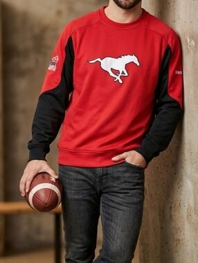 CFL/Reebok Authentic Sideline Stampeders Jersey Sweater Size XL Ptp 26" L 31"